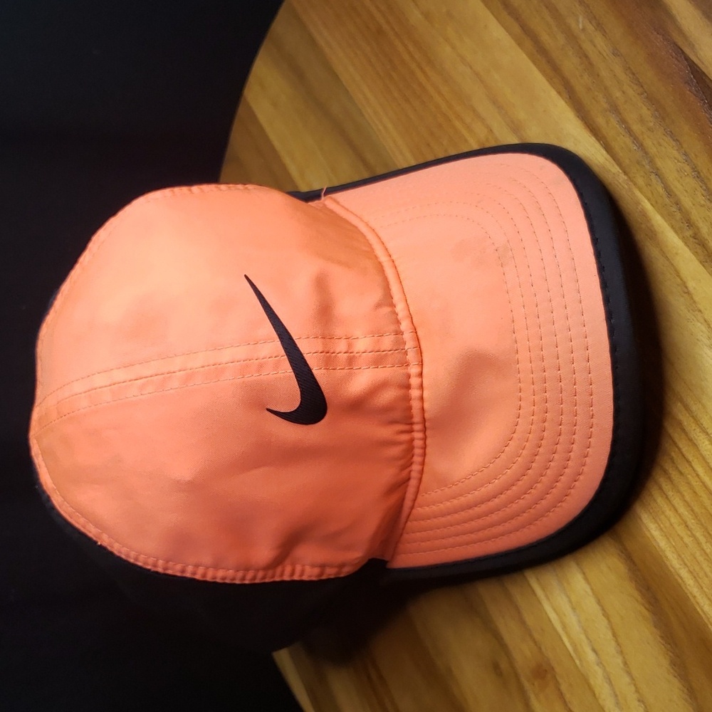 Nike 'Dri-Fit' Featherlight Women's Sports Cap in Peach - One Size Fits Most